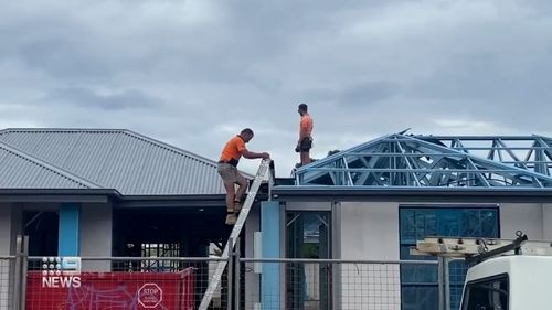 Adelaide tradies hailed as heroes after saving woman from a burning home