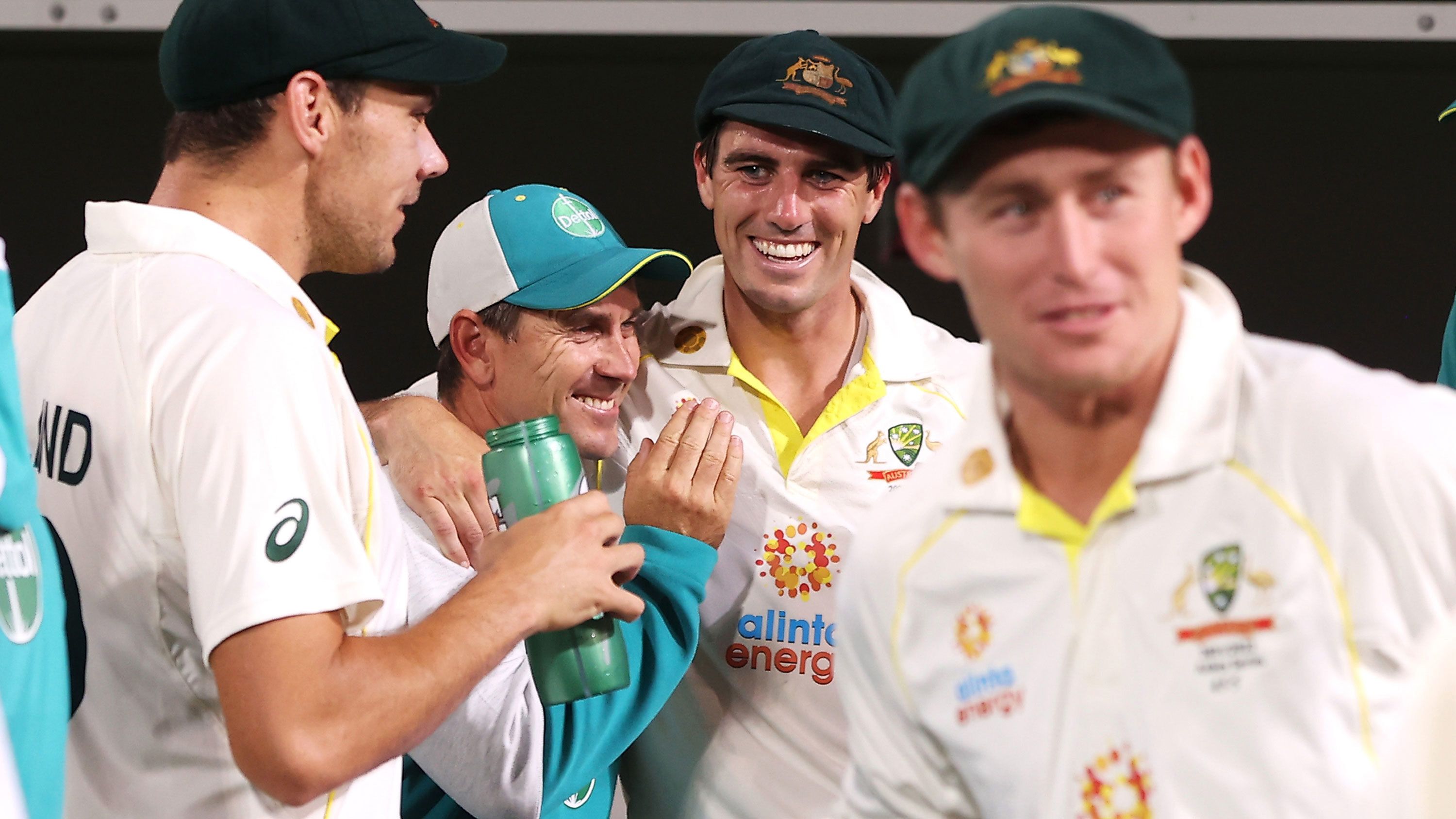 Then Australian coach Justin Langer and Australian captain Pat Cummins celebrate victory art the conclusion of the Ashes series.