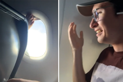 barefoot passenger closes window blind on plane