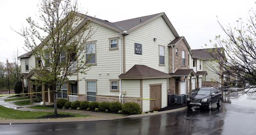 Police tape marks the apartment building reported to be where Travis Reinking lives in Nashville. (AAP)