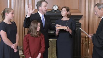 Chief Justice John G Roberts, Jr, administers the Constitutional Oath to Judge Brett Kavanaugh in the Justices Conference Room, Supreme Court Building.