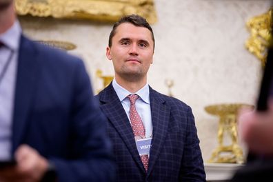 WASHINGTON, DC - MAY 28: Turning Point USA co-founder Charlie Kirk stands in the back of the room as U.S. President Donald Trump speaks during a swearing in ceremony for interim U.S. Attorney for Washington, D.C. Jeanine Pirro in the Oval Office of the White House on May 28, 2025 in Washington, DC. Trump has announced Pirro, a former Fox News personality, judge, prosecutor, and politician, after losing support in the Senate for his first choice, Ed Martin, over his views on the January 6, 2021 a