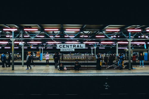 A railway platfrom at Sydney's Central Station at night