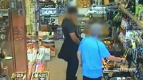 CCTV of one of the teenagers buying the knives. 