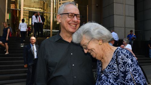 Newcastle Anglican Bishop Greg Thompson and Audrey Nash after the final public hearing to mark the end of the Royal Commission into Institutional Responses to Child Sexual Abuse in Sydney, Thursday, December 14, 2017. Audrey Nash is the mother of child abuse victim Andrew Michael Nash, who was 13 years old when he hanged himself in his bedroom in 1974. 