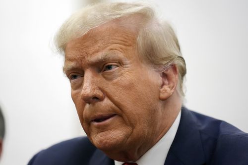 Former President Donald Trump sits in the courtroom with his legal team before the continuation of his civil business fraud trial at New York Supreme Court, Tuesday, Oct. 17, 2023, in New York 