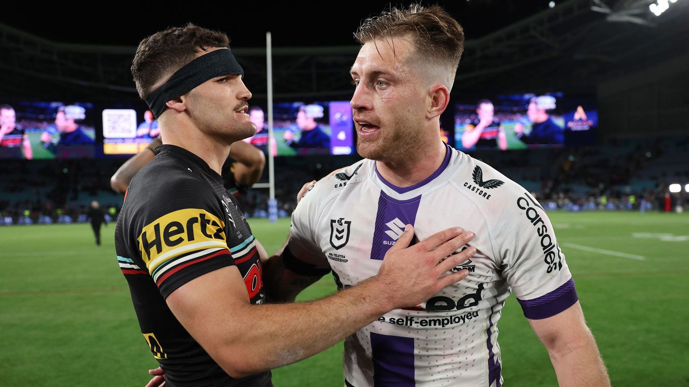 Nathan Cleary and Cameron Munster embrace after their preliminary final clash in 2023.