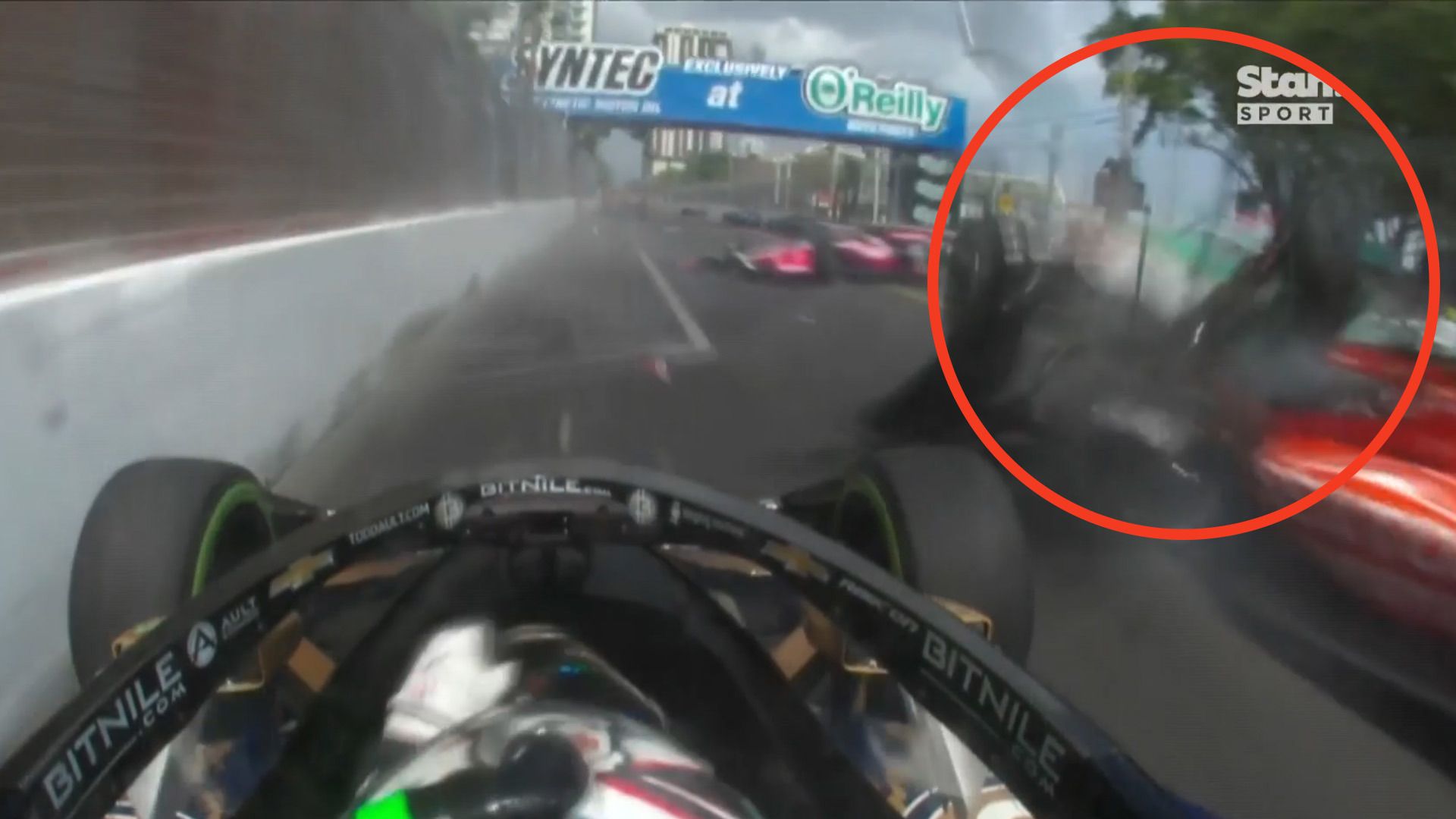 The moment Conor Daly squeezed between the concrete wall and the high-flying car of Devlin DeFrancesco.