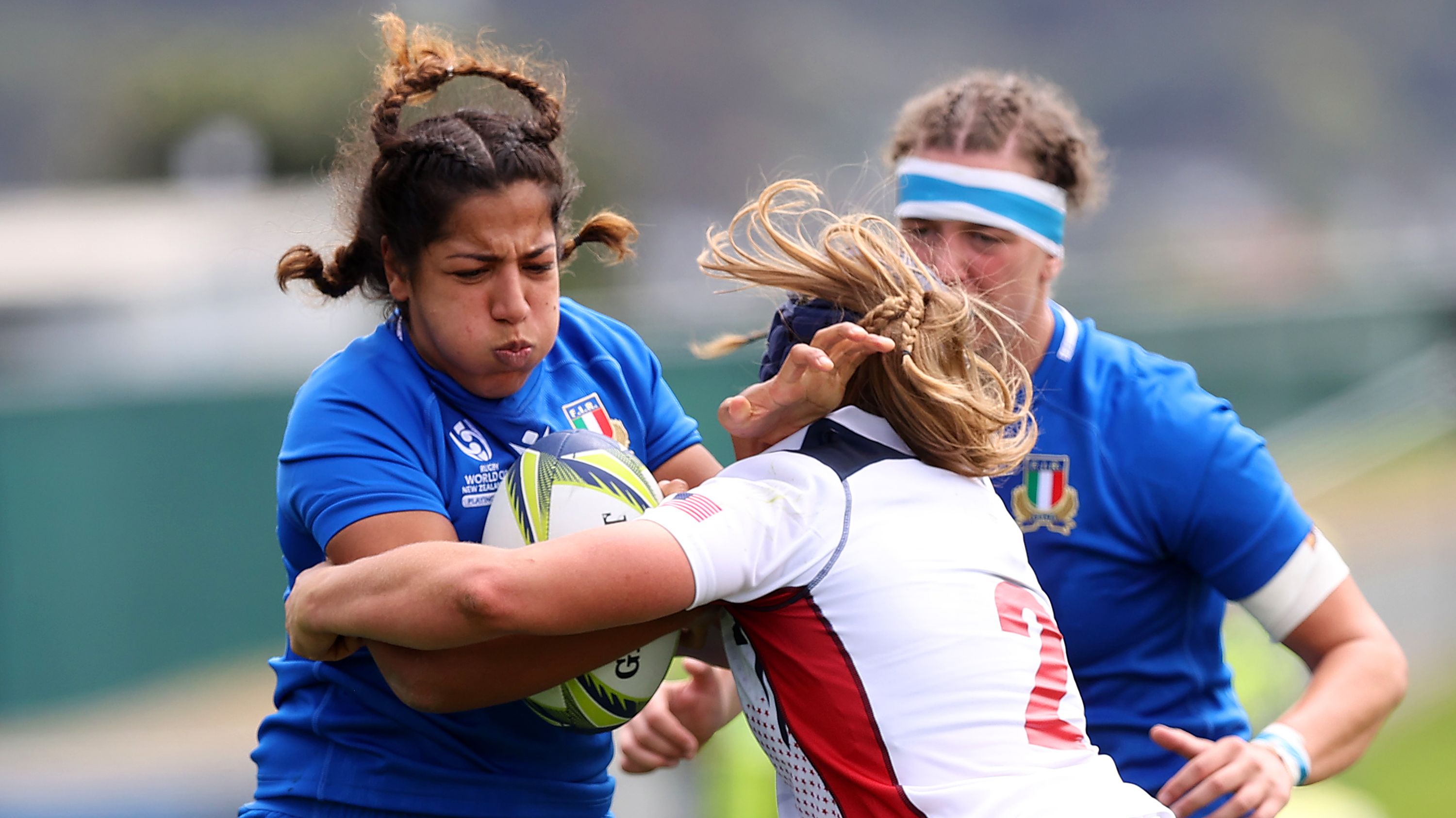 Sara Tounesi of Italy is tackled during the Rugby World Cup.