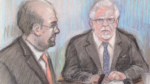 Court artist sketch by Elizabeth Cook of Rolf Harris appearing by video link at Southwark Crown Court in London. (AAP)