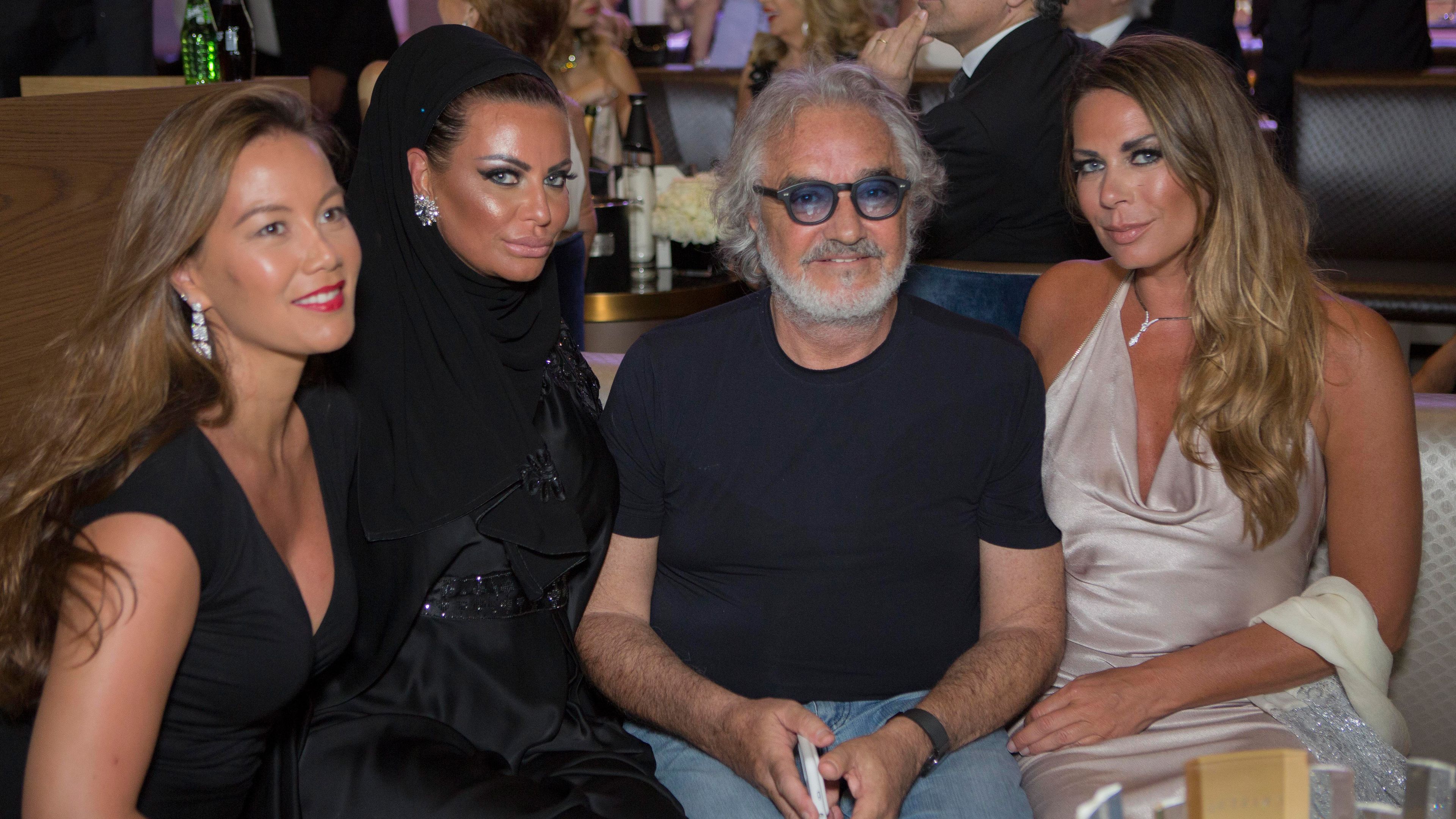 Flavio Briatore with guests during a business event in Dubai in 2016.