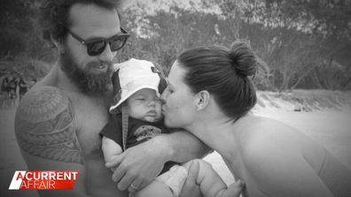 Floyd Morley with his parents Ross and Jade.