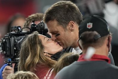 Tampa Bay Buccaneers quarterback Tom Brady kisses wife Gisele Bundchen after defeating the Kansas City Chiefs in the NFL Super Bowl 55 football game Sunday, Feb. 7, 2021, in Tampa, Florida.  