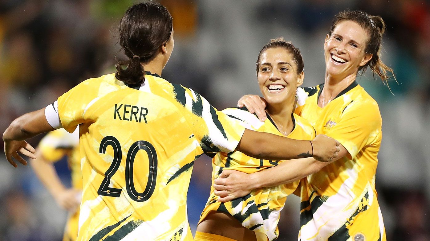 Katrina Gorry of the Matildas celebrates with her team mates Sam Kerr and Elise Kellond-Knight 