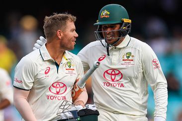 David Warner of Australia (L) and Usman Khawaja of Australia leave the field after day one of the Men&#x27;s Third Test Match in the series between Australia and Pakistan at Sydney Cricket Ground on January 03, 2024 in Sydney, Australia. (Photo by Mark Evans/Getty Images)