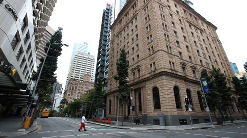 A local resident walks in the Brisbane CBD on January 9, during a lockdown in the Queensland state capital.