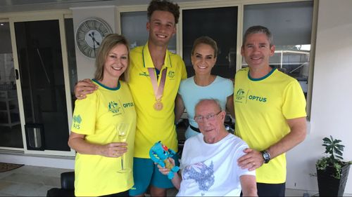 Gold medallist Kurtis Marschall (second from left) with his family.