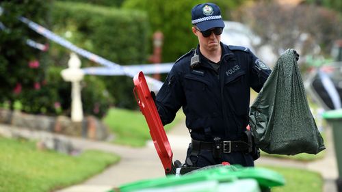 NSW Police at the scene of a deadly home invasion overnight (Joel Carrett).