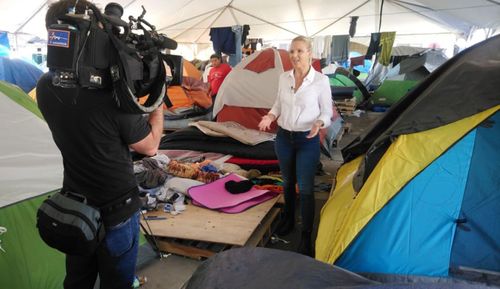 Nine reporter Alexis Daish at the El Barretal migrant camp in Mexico, close to the US border.