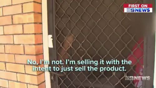 The alleged nang dealer was confronted at his front door. (9NEWS)
