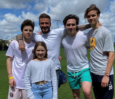 Beckham with his children Brooklyn, 21, Romeo, 17, Cruz, 15, and Harper, seven.