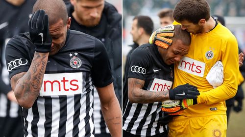 Footballer Everton Luiz leaves the field in tears after being subjected to racial abuse. (AFP)