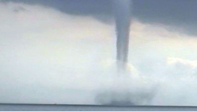 A picture of a waterspout, revealing just how dangerous they an be.