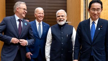 Anthony Albanese walks with US President Joe Biden, Indian Prime Minister Narendra Modi and Japanese Prime Minister Fumio Kishida, the host of the 2022 Quad summit.