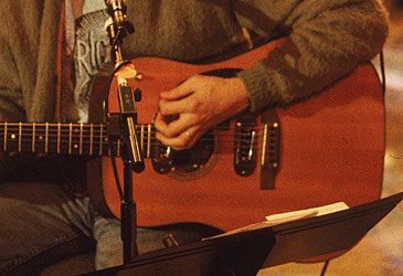 What record price for a guitar was paid for Kurt Cobain's Martin D-18E at auction in 2020?