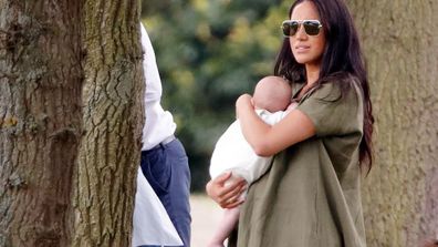 Cruel trolls lashed out at Meghan for how she was holding the two-month-old.