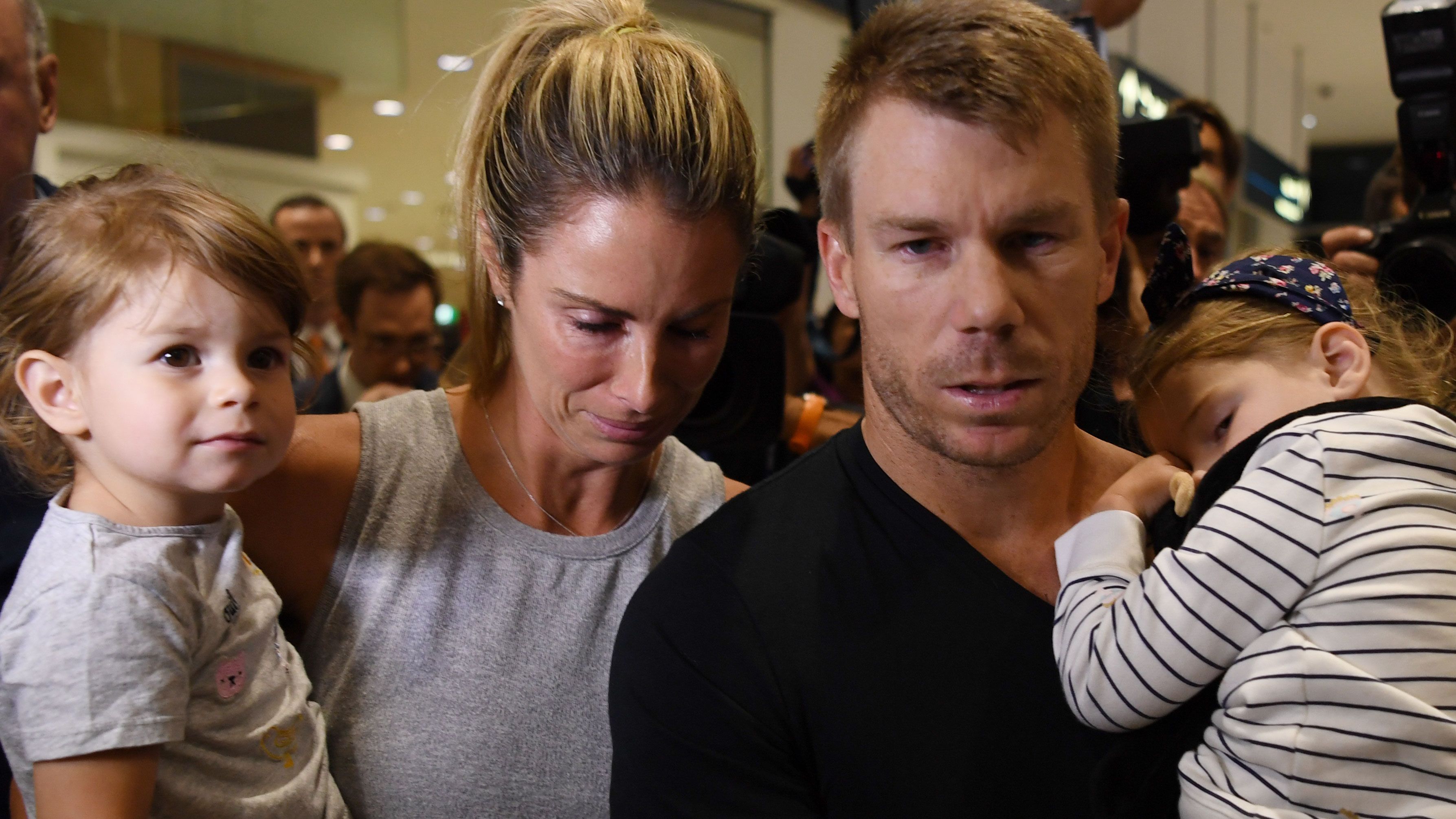 Candice Warner with husband David and their two children.