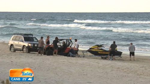 NSW woman dies after attempting to rescue young boy swept off rocks