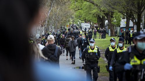 a small protest in Melbourne's Princes Park.