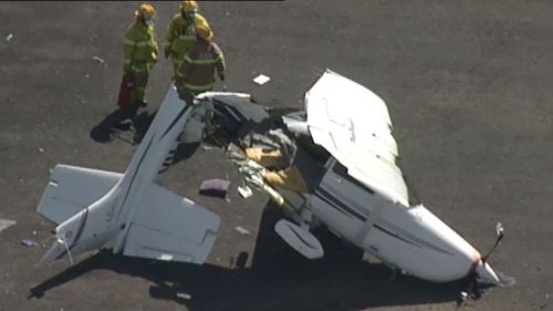 A light plane has been destroyed after clipping another when landing. (9NEWS)