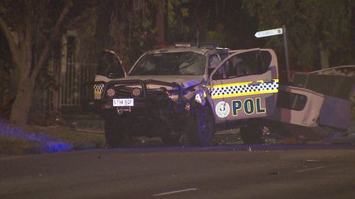 A﻿ marked police car has rolled "several times" after a Ford sedan crashed into it on a suburban street in Victor Harbor in Adelaide's south.
