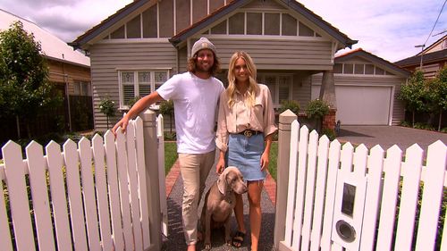 The couple with dog Isla in front of their Coburg property.