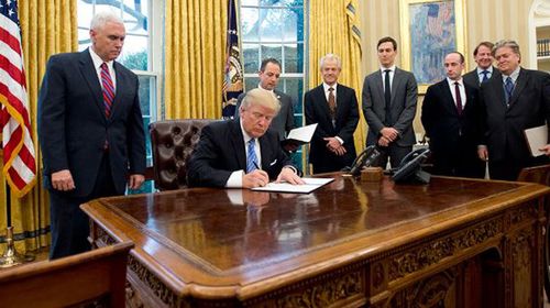 Mr Trump signed an anti-abortion order in January flanked by seven men and no women.