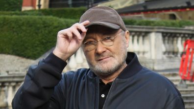 Phil Collins comes before the waiting journalists in front of the Royal Albert Hall in London, England, on October 17, 2016. (AFP)