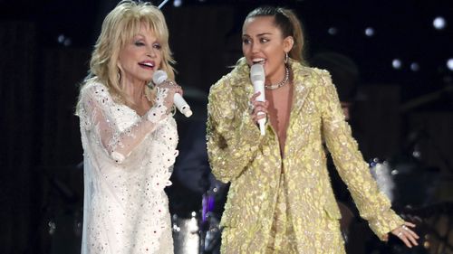 Dolly Parton and Miley Cyrus perform Jolene at the 61st annual Grammy Awards in Los Angeles.
