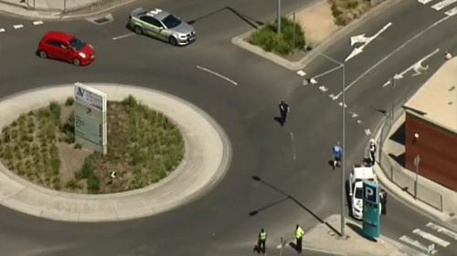Police have blocked off a number of surrounding streets while checks are conducted. (9NEWS)