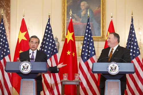 US Secretary of State Mike Pompeo (R) and Foreign Minister of China Wang Yi (L) hold a news conference at the beginning of their meeting, in the Ben Franklin Room at the State Department in Washington, DC, USA, 23 May 2018. EPA/MICHAEL REYNOLDS