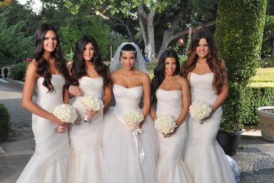 Kim's sisters were a ready-made bridal party: Kendal Jenner, Kylie Jenner, maid of honour Kourtney Kardashian and matron of honour Khloe Kardashian. The bridesmaids wore ivory Vera Wang silk organza gowns.<br/><br/>Image: Snapper