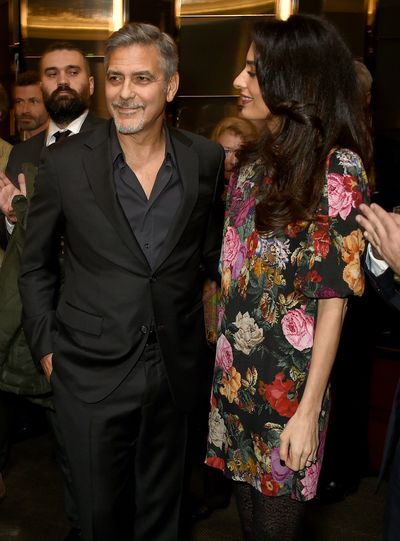 A loose dress with an eye-catching pattern always works - especially if you style it with a pair of killer heels, as Amal demonstrates time and time again.