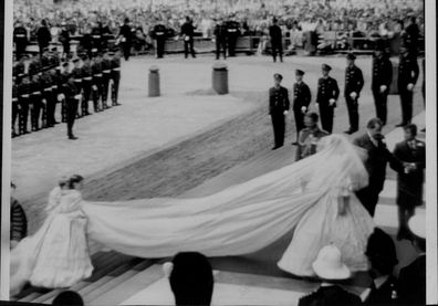 Young bridesmaids Lady Sarah Armstrong-Jones and India Hicks struggle to carry Princess Diana's 7.5 metre bridal train on her wedding day. 1981.