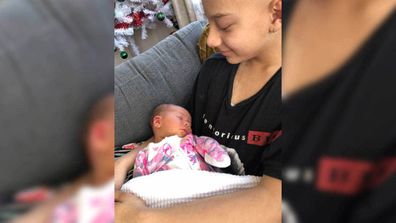 RJ with his four-week-old niece, Maria.