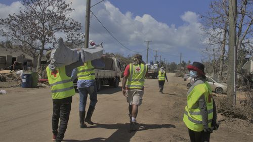 The Tonga Red Cross Society are helping deliver essential relief items such as tarpaulins, shelter tool kits and blankets to families in Kanokupolu as crews work to restore the internet. 