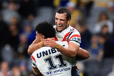 Siua Wong of the Roosters celebrates a try with team mate Billy Smith during the round 25 NRL match between Parramatta Eels and Sydney Roosters at CommBank Stadium on August 18, 2023 in Sydney, Australia. (Photo by Mark Evans/Getty Images)