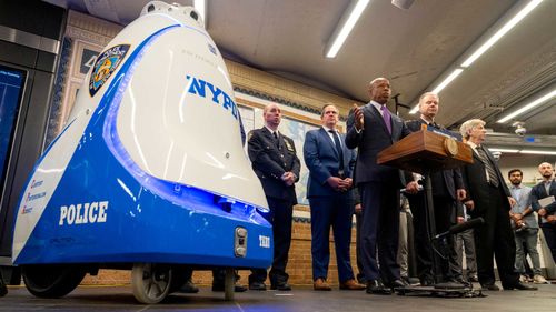 New York Mayor Eric Adams speaks during a press conference at the Times Square subway station about a Knightscope K5 autonomous security robot that was set to patrol the station.