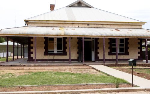 The house at Railway Terrace where convicted murderer Robert Joe Wagner stored dismembered bodies in barrels in the back of a 4wd in the driveway. (AAP Image/Rob Hutchison) 