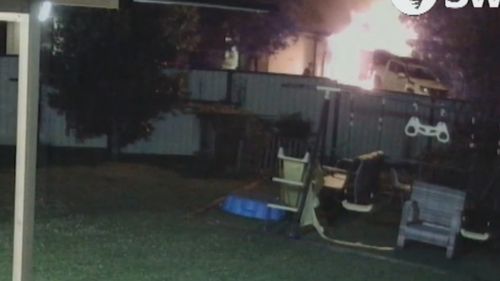 Vision has captured the moment hero neighbours rushed to save Vision has captured the moment hero neighbours rushed to save the life of a man who fled his burning home south of Brisbane overnight.the life of a man who fled his burning home south of Brisbane overnight.